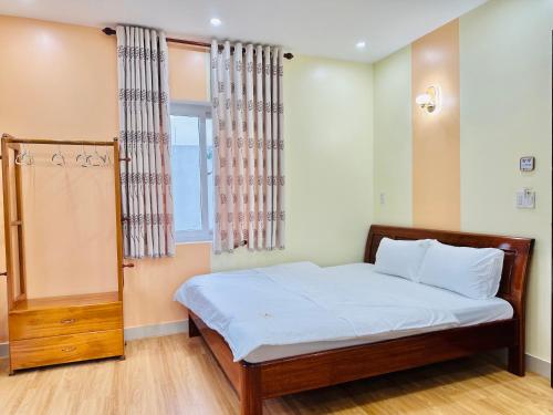 Ένα ή περισσότερα κρεβάτια σε δωμάτιο στο PU Homestay