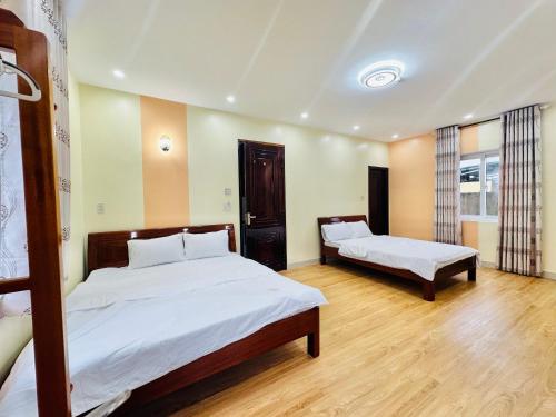 Ένα ή περισσότερα κρεβάτια σε δωμάτιο στο PU Homestay
