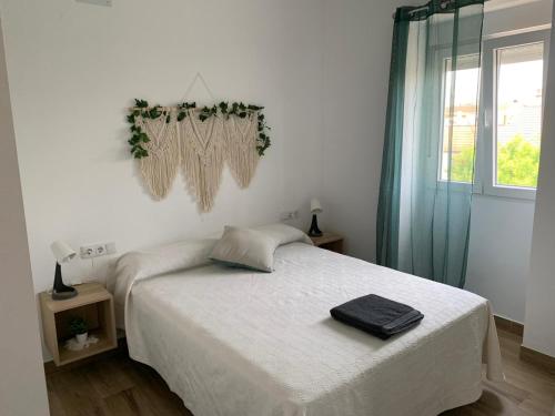 Postel nebo postele na pokoji v ubytování El Rincon de los Girasoles