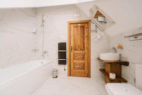 Koupelna v ubytování Hotel Porto Tara