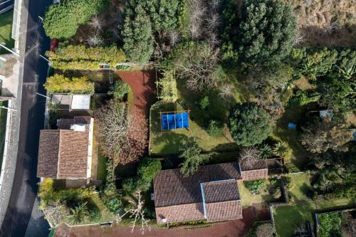 an overhead view of a house with a garden at Casa Villa Garden in Ponta Delgada