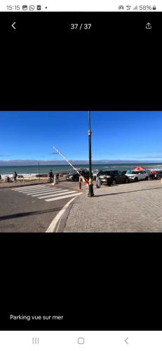 a picture of a street with cars parked in a parking lot at Riad de charme - la perle des Oudayas in Rabat