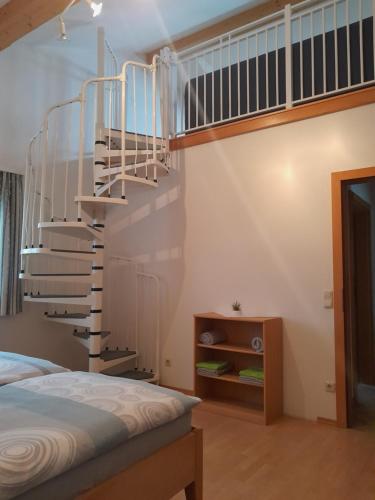 Postel nebo postele na pokoji v ubytování Ferienwohnung Moorblick