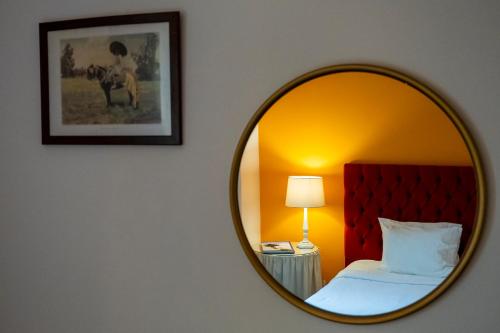 Un ou plusieurs lits dans un hébergement de l'établissement Casa Villa Cottage