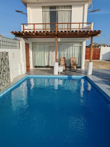 Bazén v ubytování HOUSE WHITE VICHAYITO BEACH nebo v jeho okolí