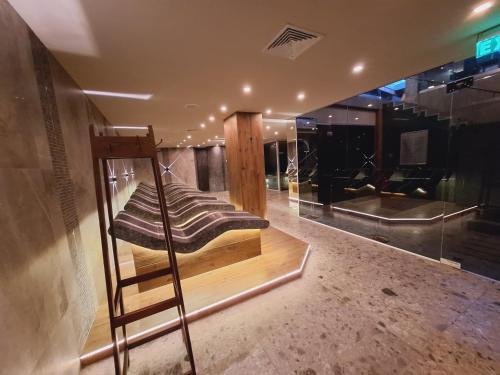 a museum with a pile of pillows on display at Slopes View Private Apartment - Luxury SPA in the 4-Star St Ivan Rilski Complex in Bansko