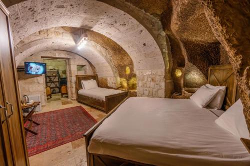 Belenus Cave Houseにあるベッド