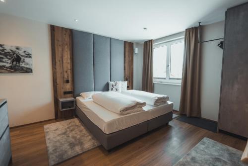 Posteľ alebo postele v izbe v ubytovaní Seekarspitz Boutique Appartements