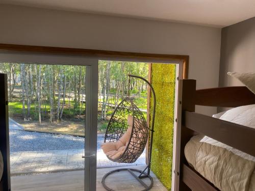 Giường trong phòng chung tại Boker Tov Pucon