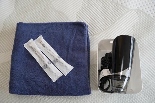 a blender sitting on top of a blue towel at エル白馬 L hakuba in Hakuba