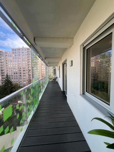 a balcony with a view of a building at La défense Courbevoie in Courbevoie