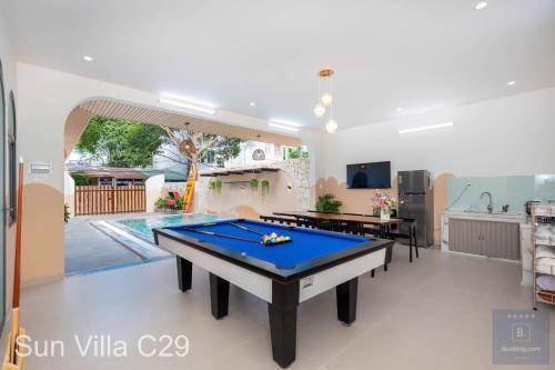 a living room with a pool table in it at C29 Đi Bộ Ra Biển - Trệt Không Lầu - Free Bida - Loa Karaoke in Vung Tau