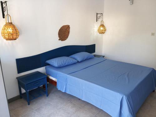 Postel nebo postele na pokoji v ubytování Exotica Sense