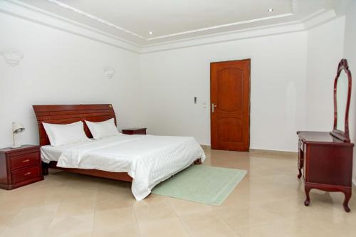 Ένα ή περισσότερα κρεβάτια σε δωμάτιο στο ETOILE BRILLANTE du Matin