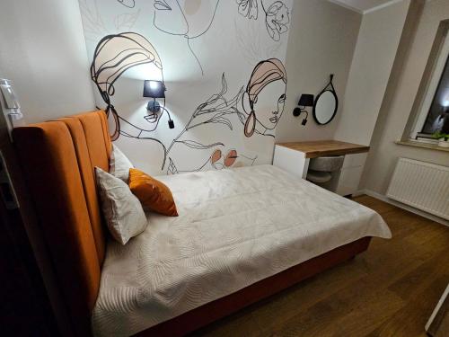 Katil atau katil-katil dalam bilik di Apartament Podskarpie