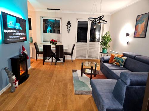 Televisyen dan/atau pusat hiburan di Apartament Podskarpie