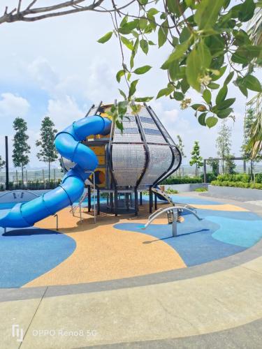a blue water slide in a park at Sweet Escape at Splashmania in Banting