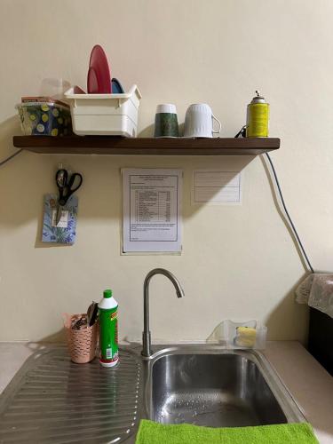 Η κουζίνα ή μικρή κουζίνα στο DHW Homestay