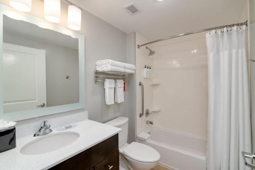 a bathroom with a sink and a toilet and a shower at TownePlace Suites by Marriott Dallas McKinney in McKinney