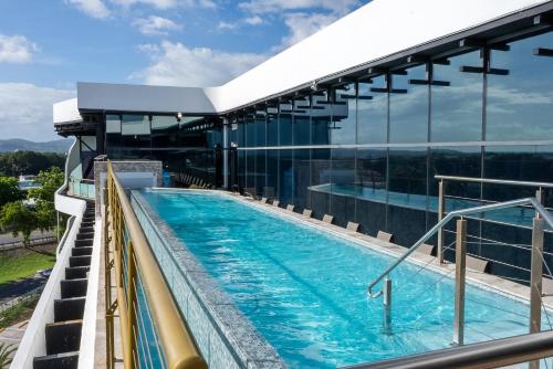 a swimming pool on top of a building at Aloft Ponce Hotel & Casino in Ponce