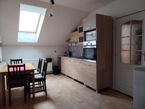 Kuchyň nebo kuchyňský kout v ubytování Apartmán Nerudovka