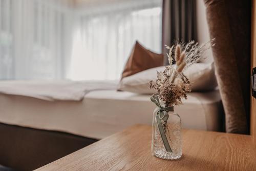 Postel nebo postele na pokoji v ubytování Freina Mountain Lifestyle Hotel