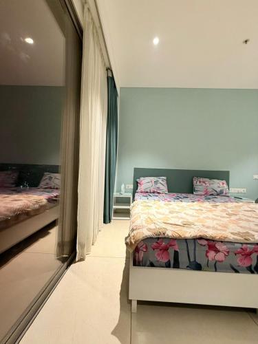 Katil atau katil-katil dalam bilik di Green Studio - Private Jacuzzi - Private Balcony