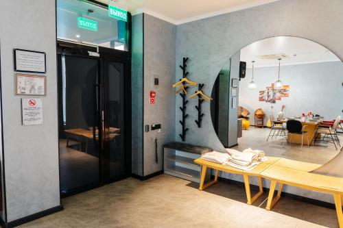 a restaurant with a table and a dining room at SULO VIP Spa in Atyraū