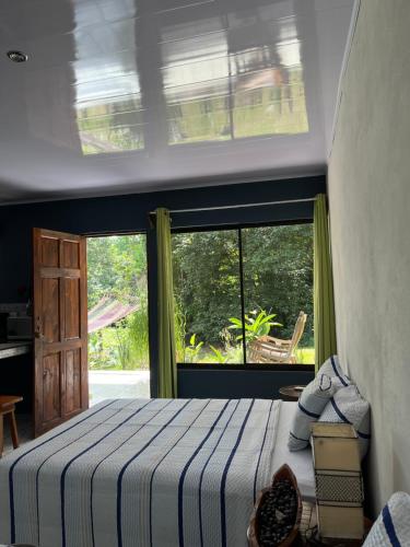 Postel nebo postele na pokoji v ubytování Villa Granja Agua Azul-wi-fi-AC-6 Personas-parqueo