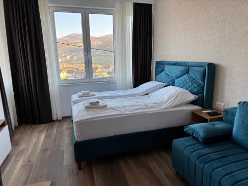 Postel nebo postele na pokoji v ubytování Mecks apartmani