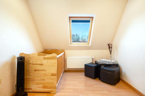 a room with two boxes and a window at Landhaus Familie Allgeier in Holtgast