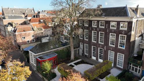 an aerial view of a building in a city at Royal Rooms Dordrecht in Dordrecht