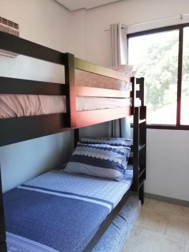 Letto o letti in una camera di ONE Guest Place 2BHK Apartment near Silay Airport
