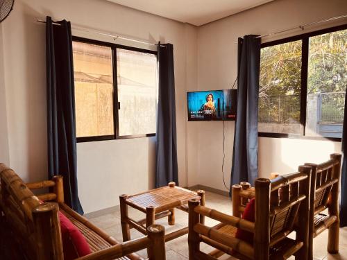TV o dispositivi per l'intrattenimento presso ONE Guest Place 2BHK Apartment near Silay Airport