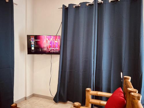 TV o dispositivi per l'intrattenimento presso ONE Guest Place 2BHK Apartment near Silay Airport