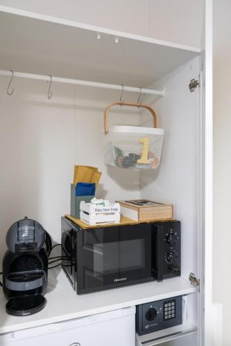 Η κουζίνα ή μικρή κουζίνα στο Tinellari Rooms