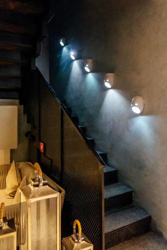 a staircase in a room with smoke coming down it at SULO VIP Spa in Atyraū