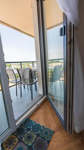 Μπαλκόνι ή βεράντα στο Apartament ODNOWA M29 basen i jacuzzi