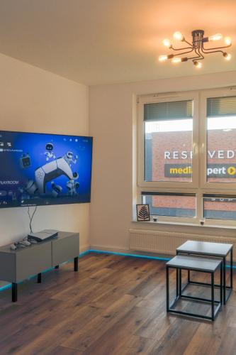 Televisyen dan/atau pusat hiburan di Apartament Nowe Centrum