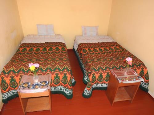 Ein Bett oder Betten in einem Zimmer der Unterkunft Hospedaje Estrellita