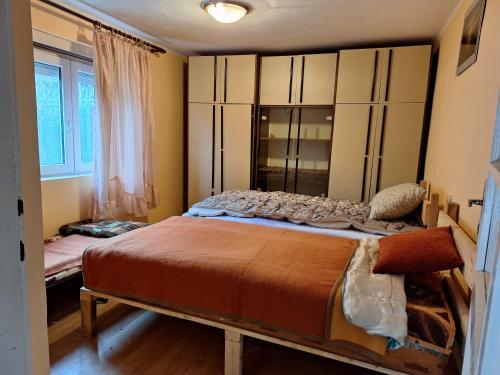 Ένα ή περισσότερα κρεβάτια σε δωμάτιο στο Cozy Home