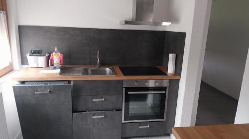Kuchyň nebo kuchyňský kout v ubytování Apartment Matthes