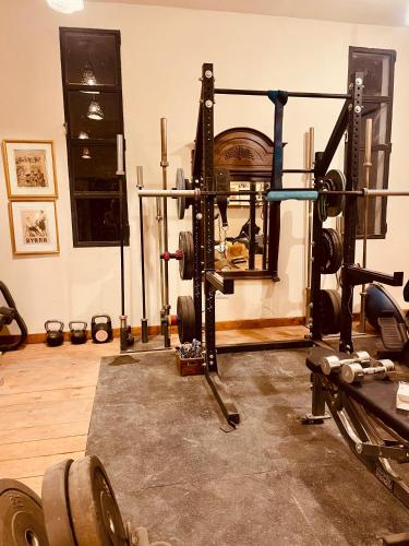 a room with a gym with dumbbells in it at Romantic Best View - Saïss Bay Estate - Coco Green in Sidi Kaouki