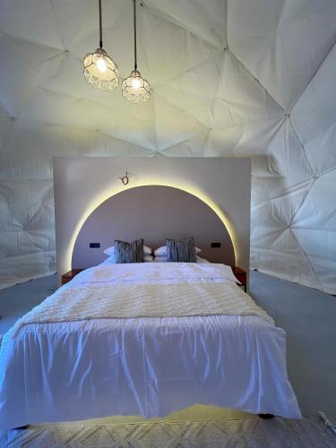 Sunset domes private campにあるベッド