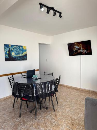 Televisyen dan/atau pusat hiburan di Complejo NAEN - Apartamentos a 1 Cuadra del Mar - Mar del Tuyú
