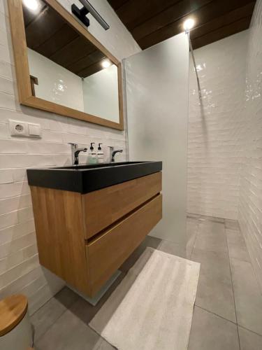 a bathroom with a sink and a mirror at Apartment Ivy, Mountain view in Kaprun