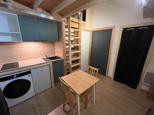 Køkken eller tekøkken på Studio La Muzelle Bourg d'Oisans