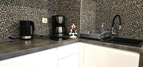 Dapur atau dapur kecil di Apartamenty Miku