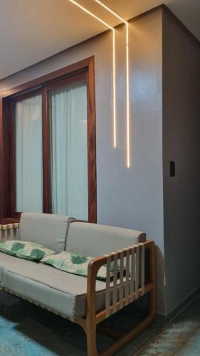 Ένα ή περισσότερα κρεβάτια σε δωμάτιο στο Milos Hotel Icaraizinho