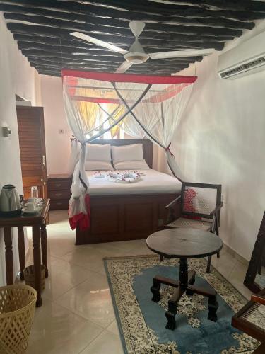 Letto o letti in una camera di Habari House